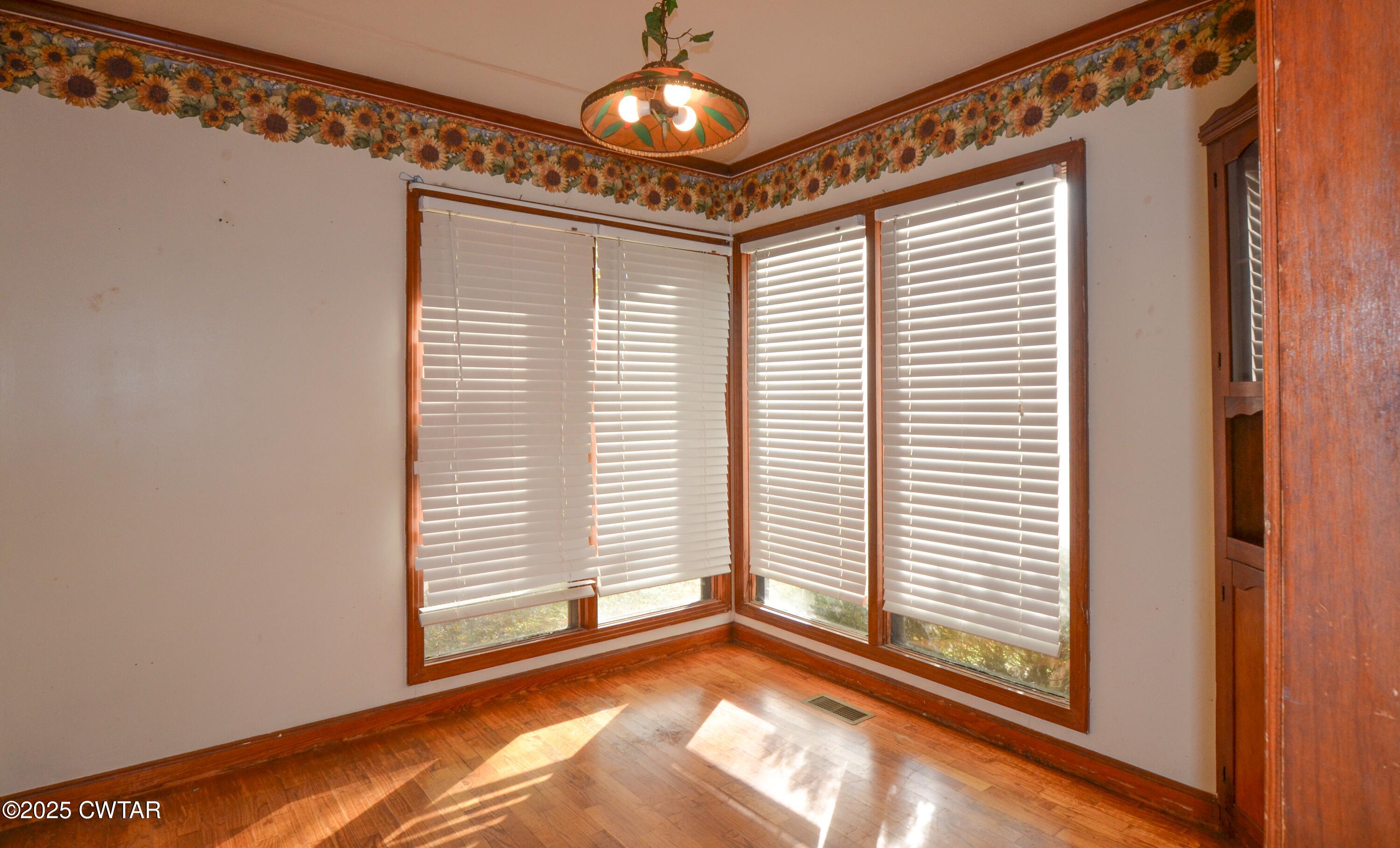 123 Sunset Drive Bells, TN 38006 - Photo 11 of 23 a view of an empty room with a window