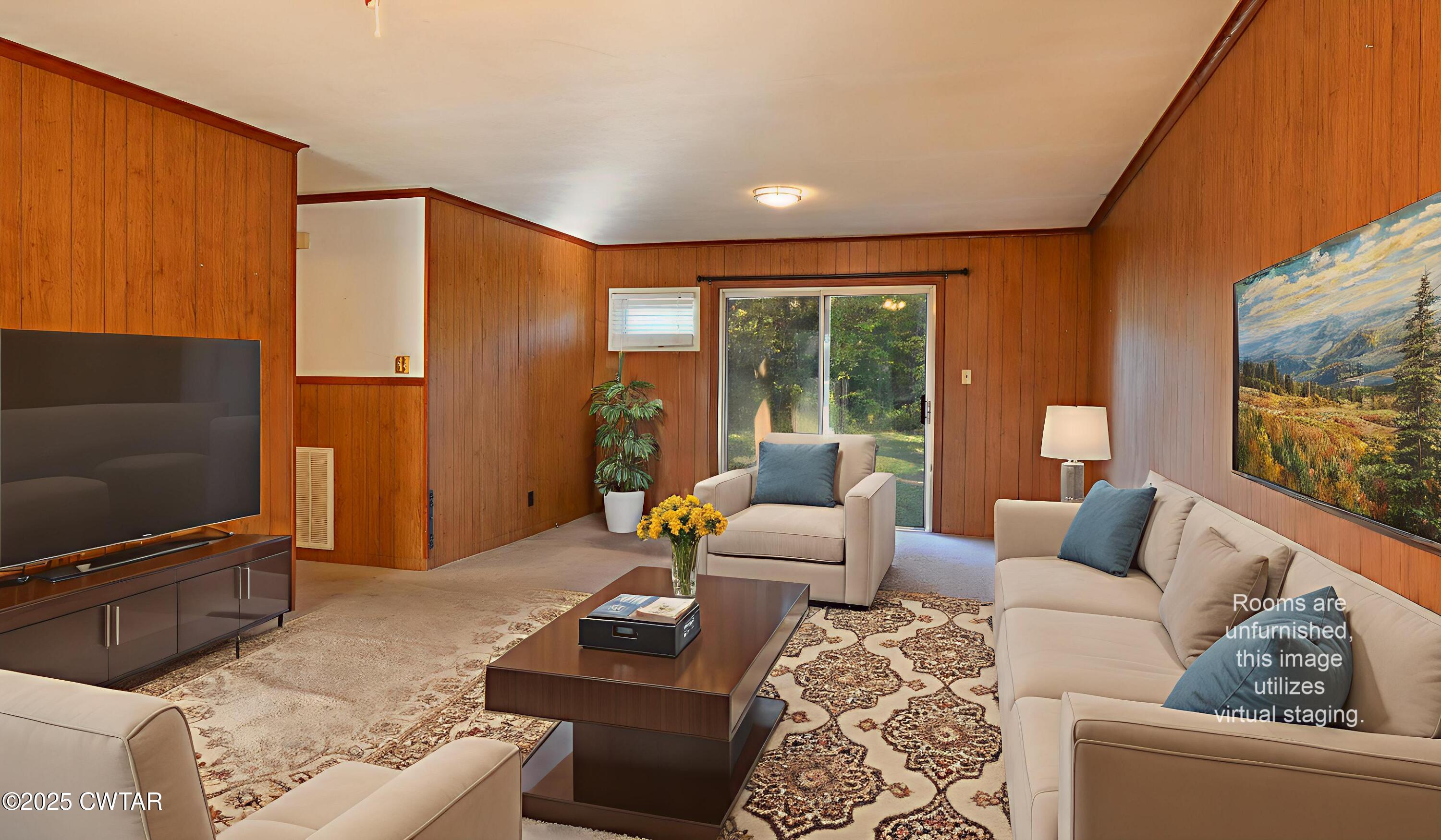 123 Sunset Drive Bells, TN 38006 - Photo 14 of 23 a living room with furniture and a flat screen tv