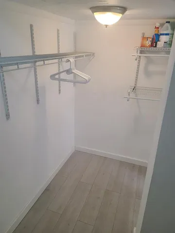 a view of a room with racks on the wall