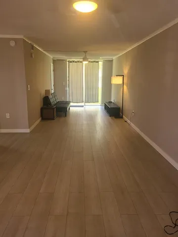 a view of a livingroom with a flat screen tv