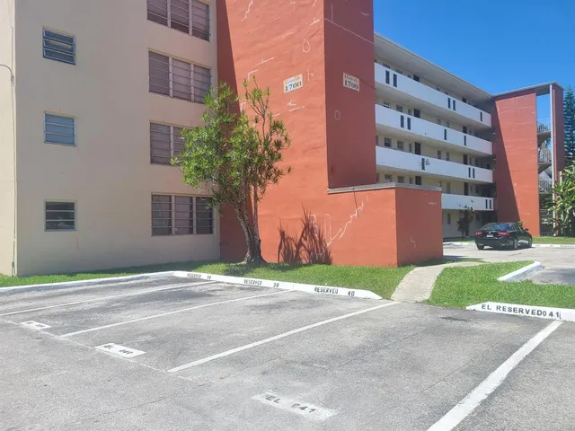 a brick building with a street