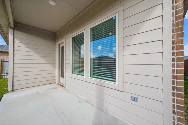 a view of a house with a large window