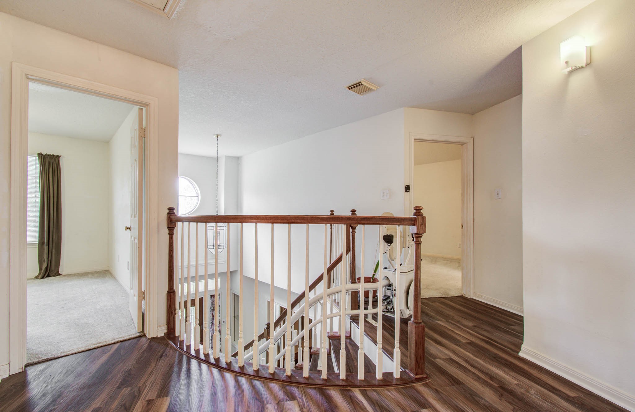 211 Squires Bend Stafford, TX 77477 - Photo 13 of 25 a view of entryway with wooden floor