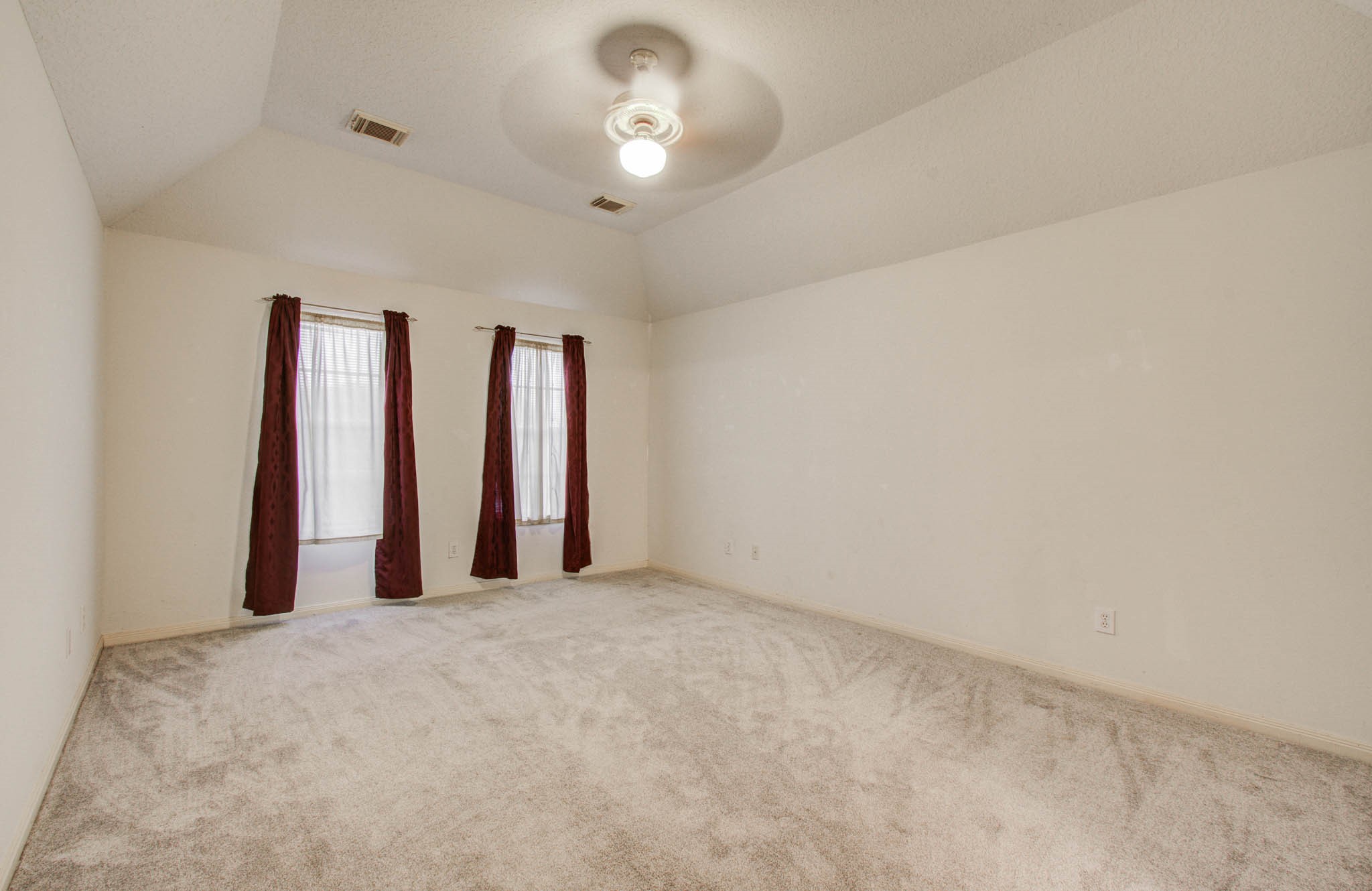 211 Squires Bend Stafford, TX 77477 - Photo 15 of 25 an empty room with windows and closet