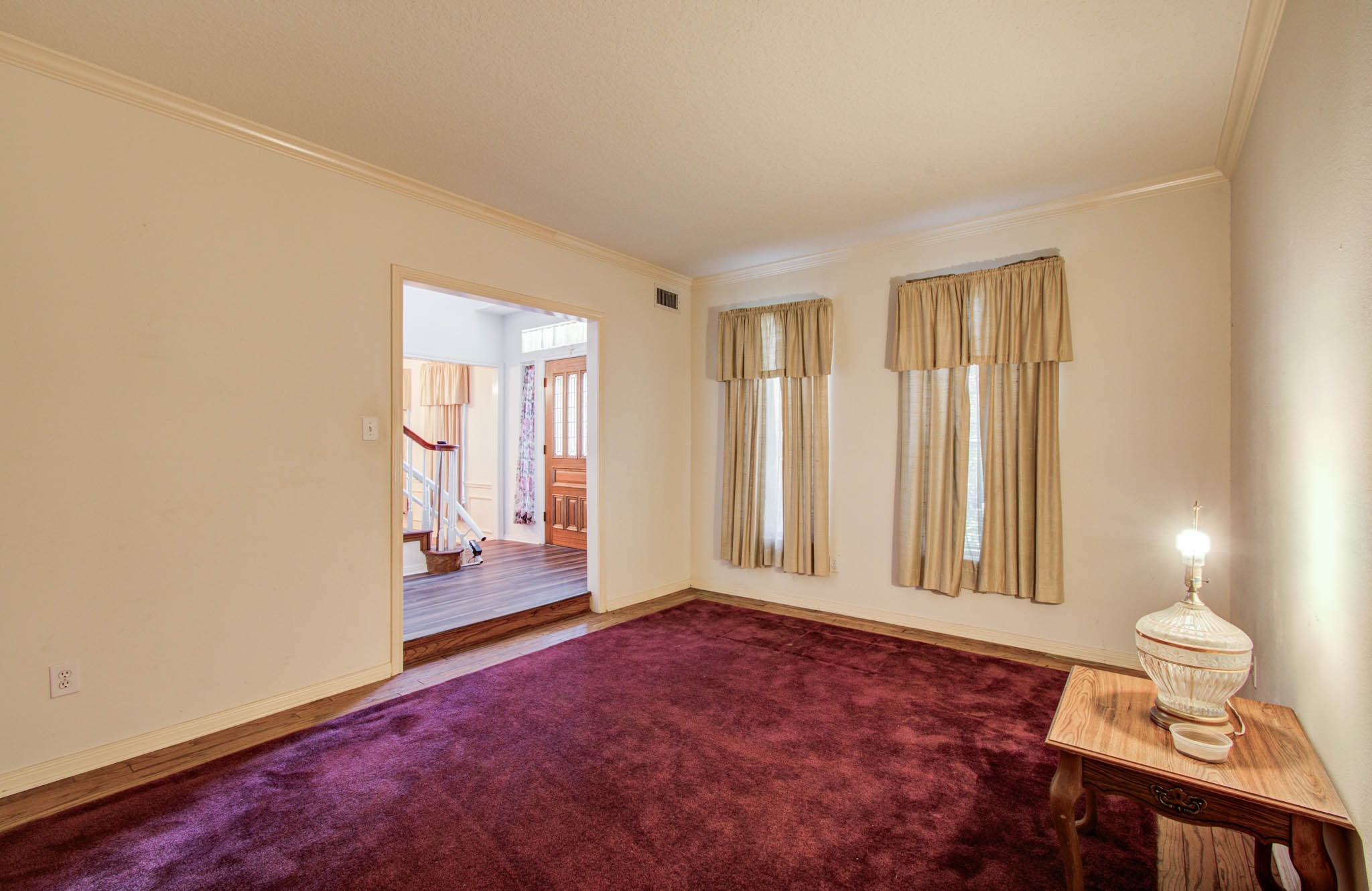 211 Squires Bend Stafford, TX 77477 - Photo 4 of 25 an empty room with windows and closet