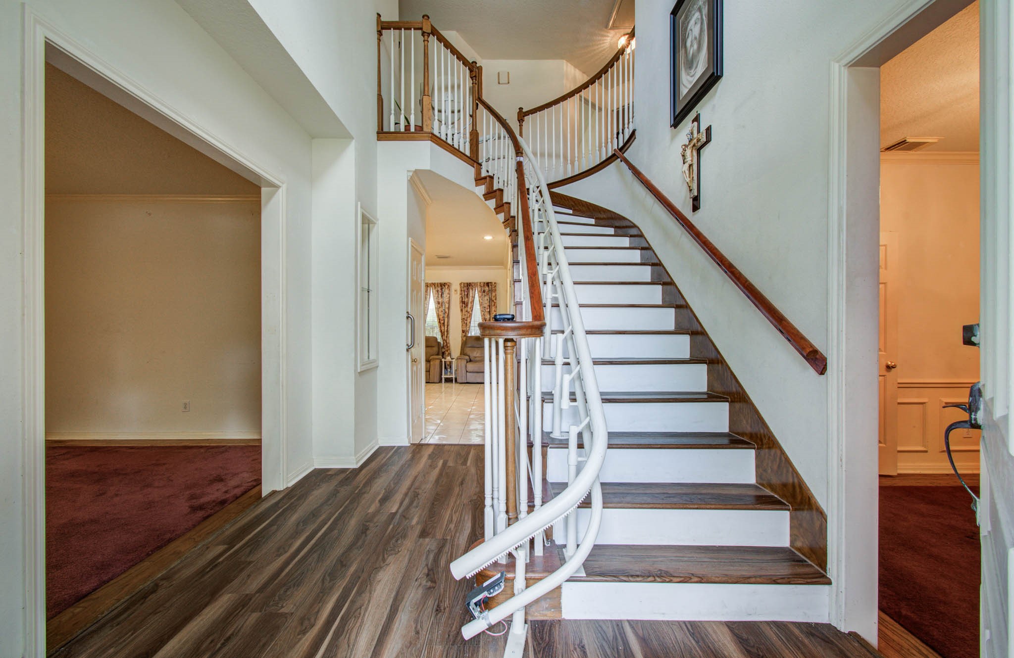 211 Squires Bend Stafford, TX 77477 - Photo 5 of 25 a view of entryway and hall with wooden floor