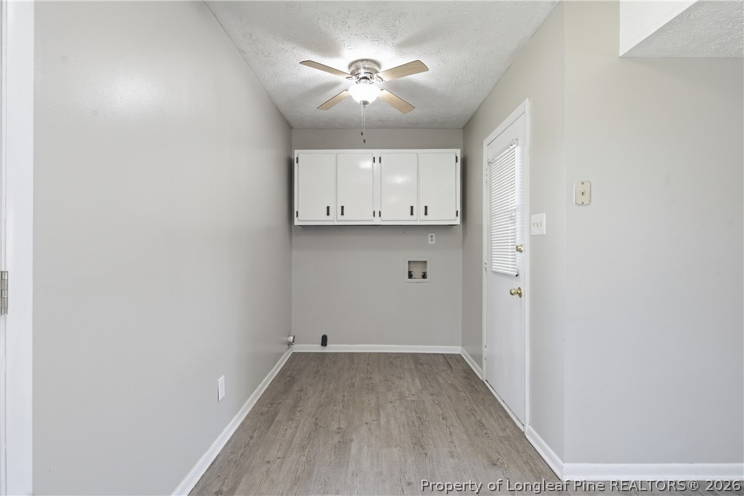 6319 Rustic Ridge Hope Mills, NC 28348 - Photo 16 of 39 an empty room with closet and a ceiling fan