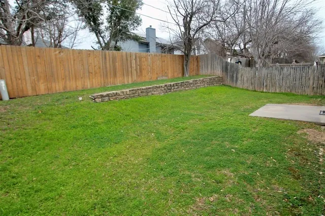 a view of a house with a garden