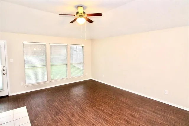 a kitchen with a sink a counter top space and stainless steel appliances
