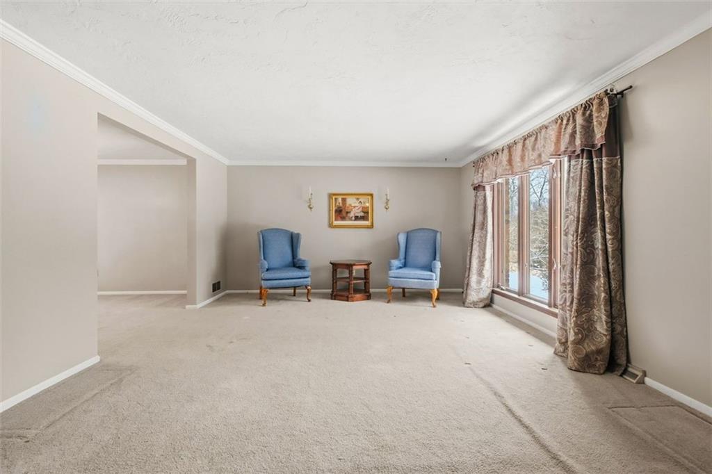 21 West Hillcrest Road Eighty Four, PA 15330 - Photo 12 of 48 The living room has plenty of natural lighting due to the large picture window providing a beautiful view as well.