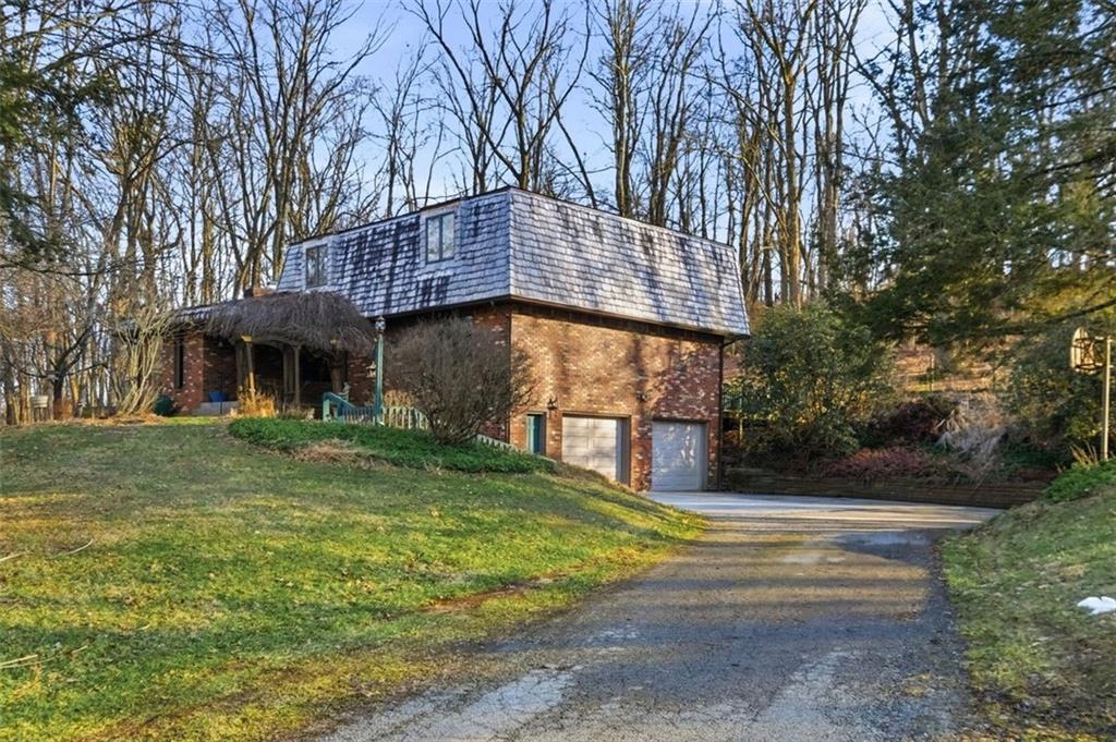 21 West Hillcrest Road Eighty Four, PA 15330 - Photo 7 of 48 This lovely home features a level driveway leading to an oversized 2 car integral garage.