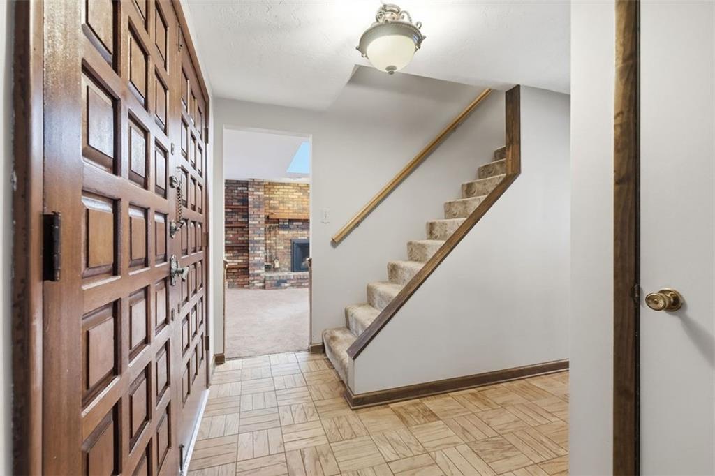 21 West Hillcrest Road Eighty Four, PA 15330 - Photo 9 of 48 Lovely parquet wood flooring in entry and hallway. This home has rich wood tones and accents throughout.
