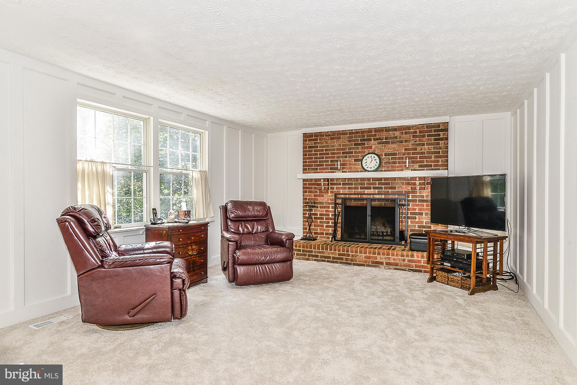 8457 Rushing Creek Court Springfield, VA 22153 - Photo 10 of 28 Wood burning fireplace