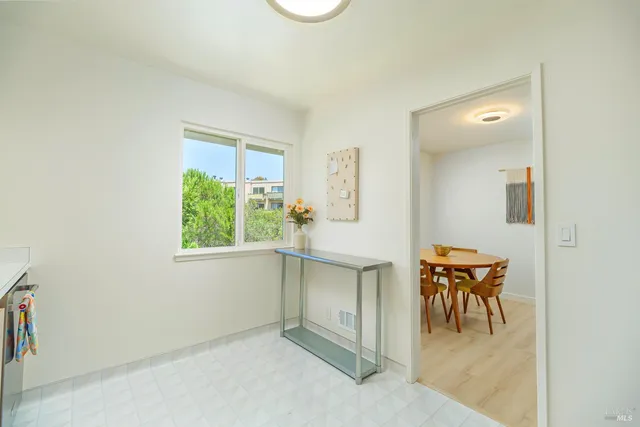 a view of a livingroom with furniture and window