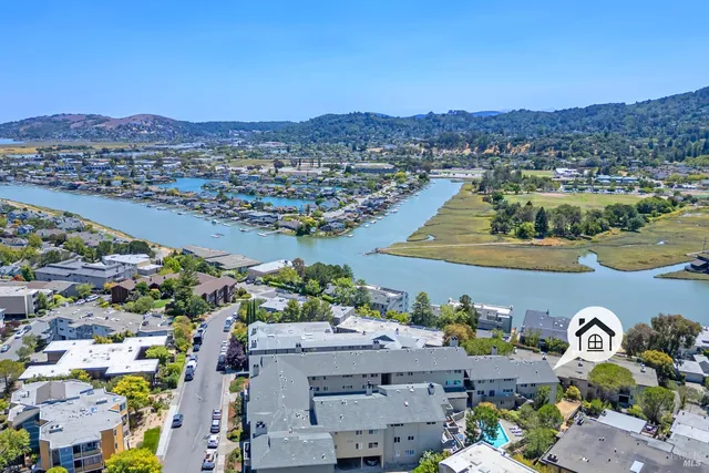 an aerial view of a house with a outdoor space