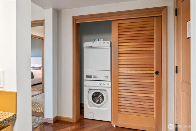 a bedroom with bed and a window