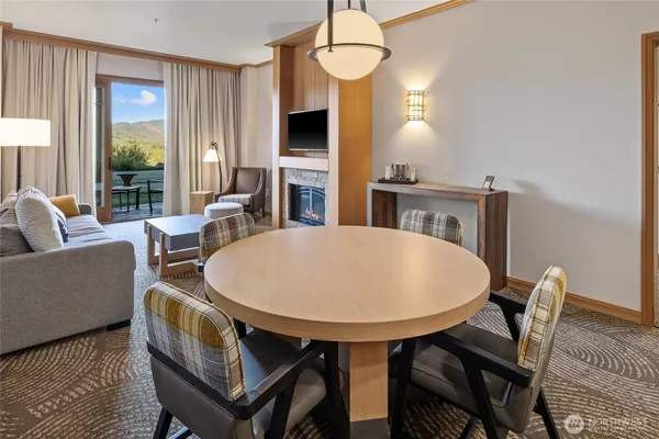 a view of a dining room with furniture