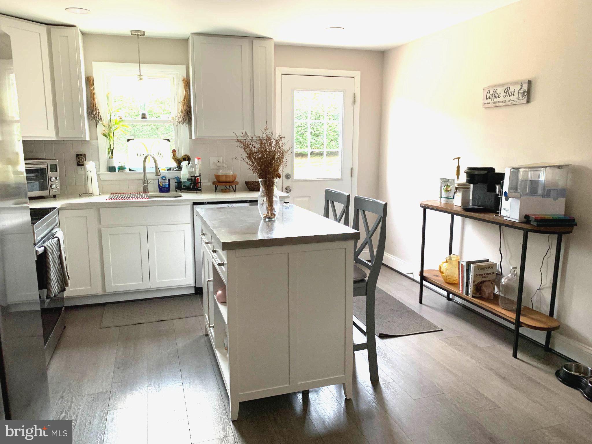 105 Warfieldsburg Road Westminster, MD 21157 - Photo 11 of 34 Bright and airy modern kitchen space.