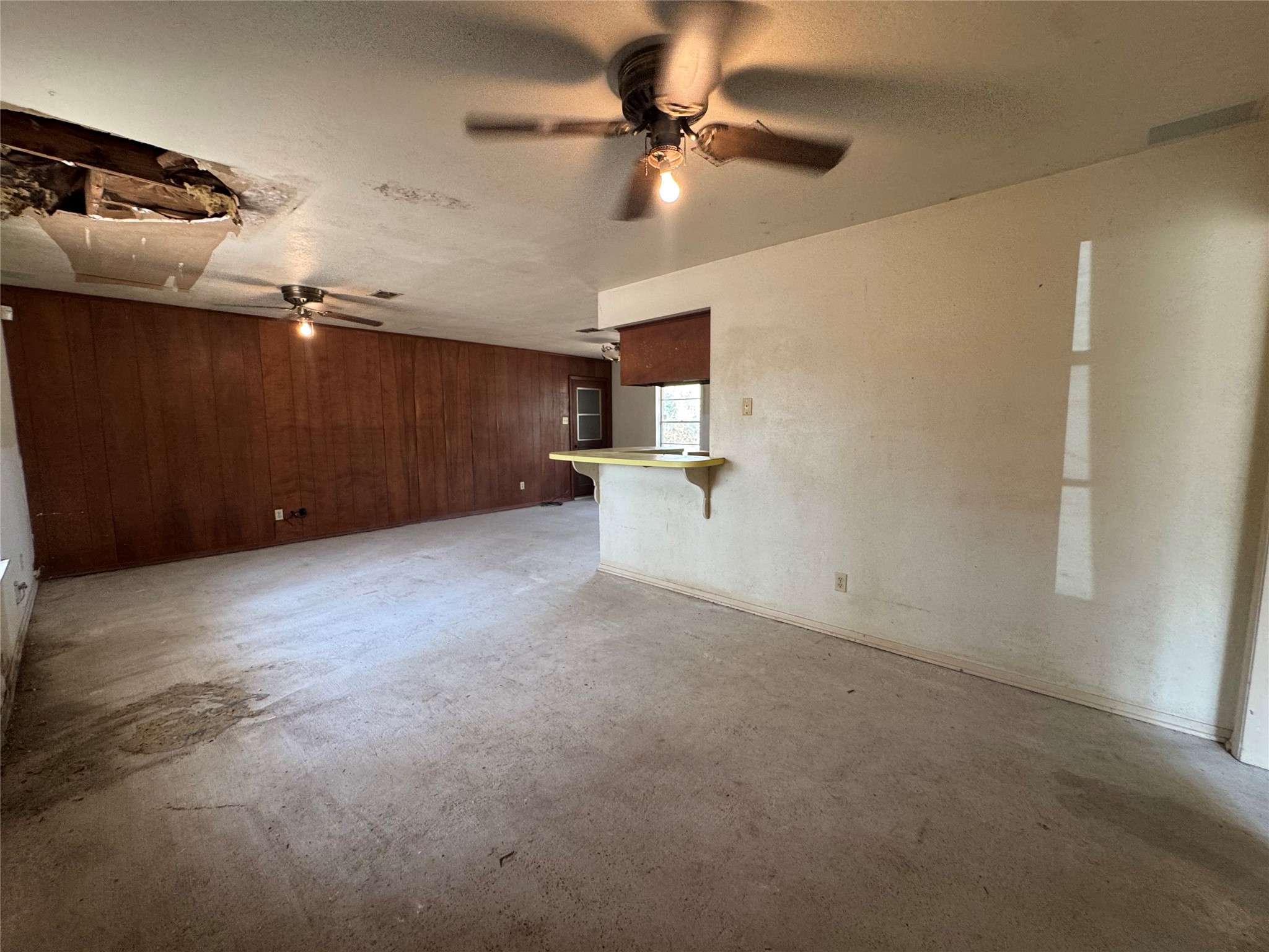 317 Bob Wills Road Livingston, TX 77351 - Photo 6 of 24 a view of a big room with carpet