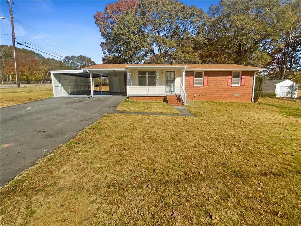 front view of a house with a yard