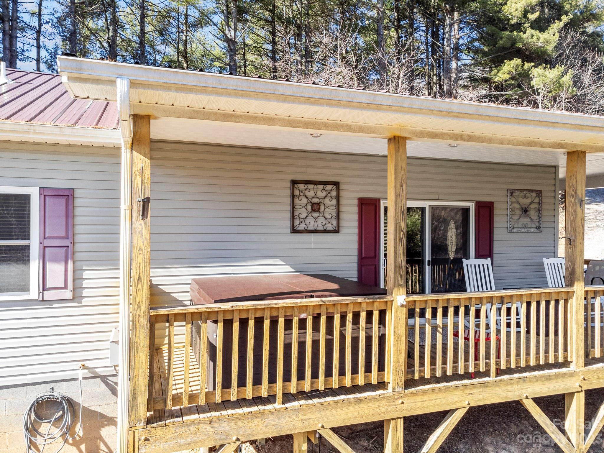 174 Diamond Point Canton, NC 28716 - Photo 33 of 43 a view of a two chairs and table in a patio