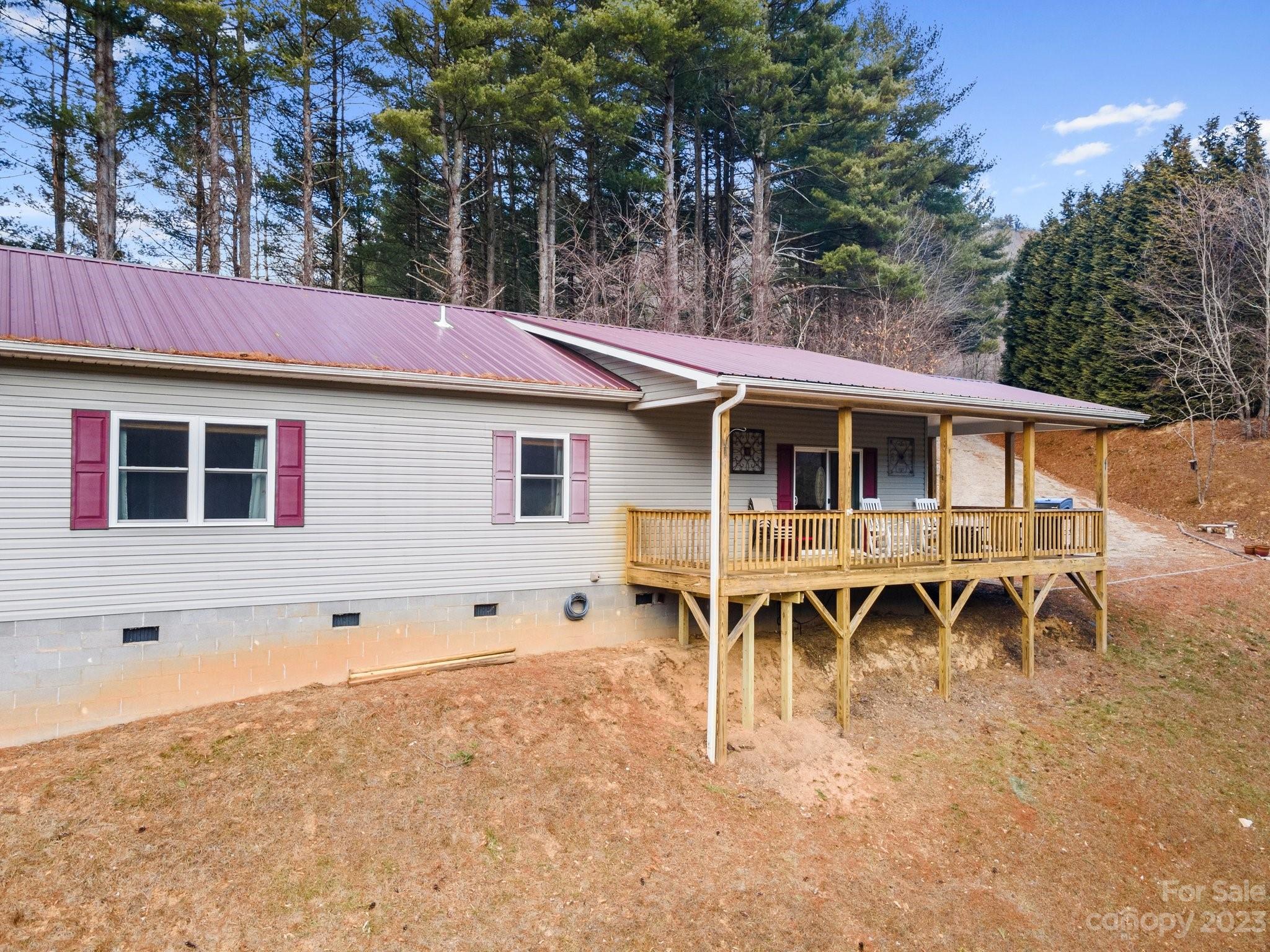 174 Diamond Point Canton, NC 28716 - Photo 4 of 43 a view of a house with a backyard
