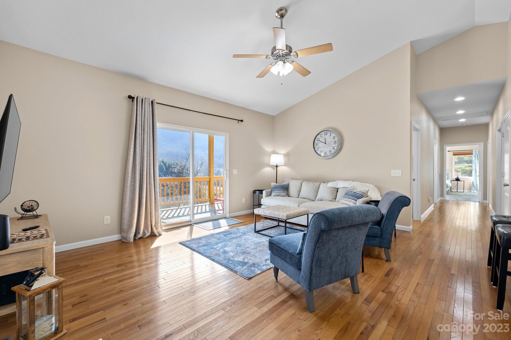 174 Diamond Point Canton, NC 28716 - Photo 6 of 43 a living room with furniture and a chandelier