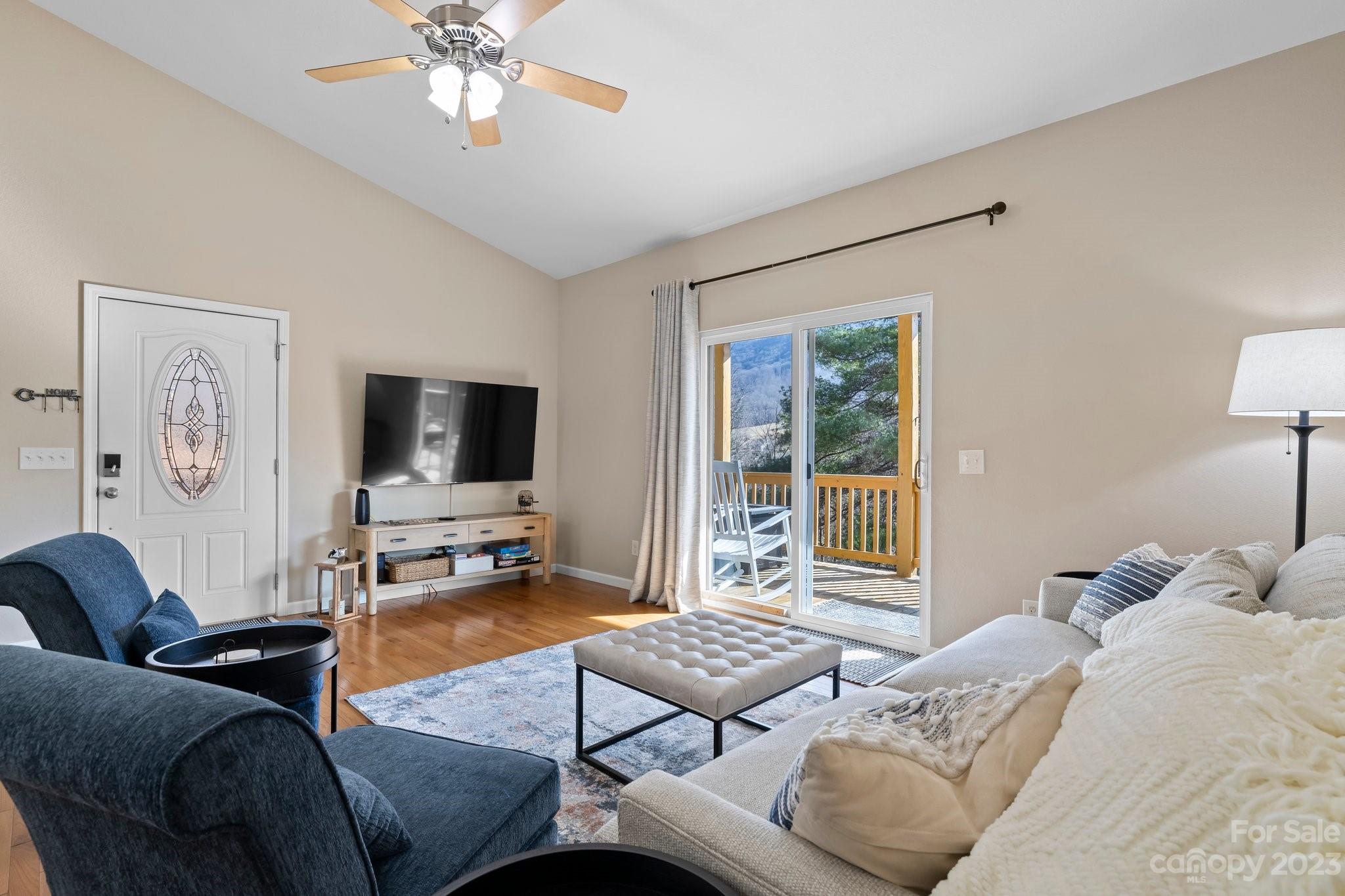 174 Diamond Point Canton, NC 28716 - Photo 9 of 43 a living room with furniture and a flat screen tv