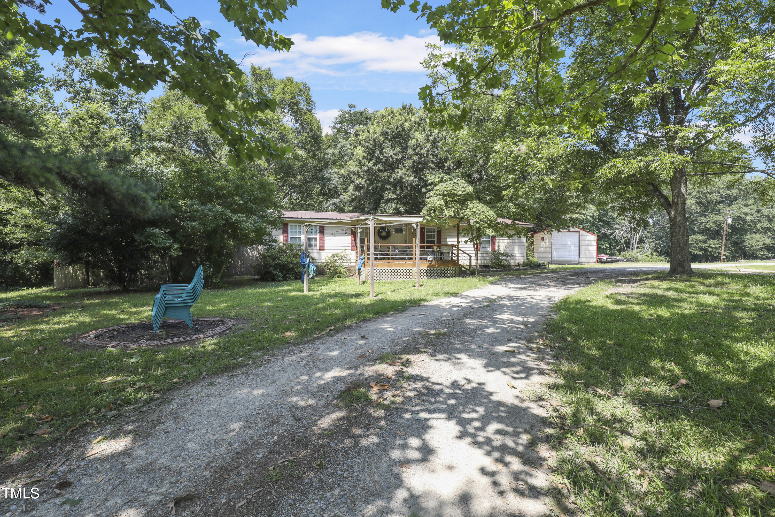 3204 Friendship Road Apex, NC 27502 - Photo 2 of 10 a house view with a garden space
