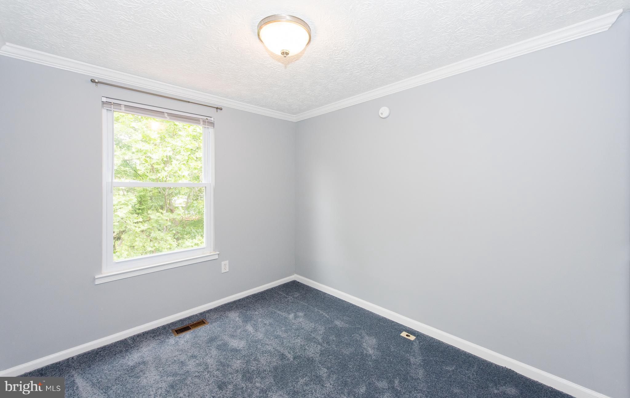 35 Hyacinth Road Baltimore, MD 21234 - Photo 12 of 23 an empty room with a window