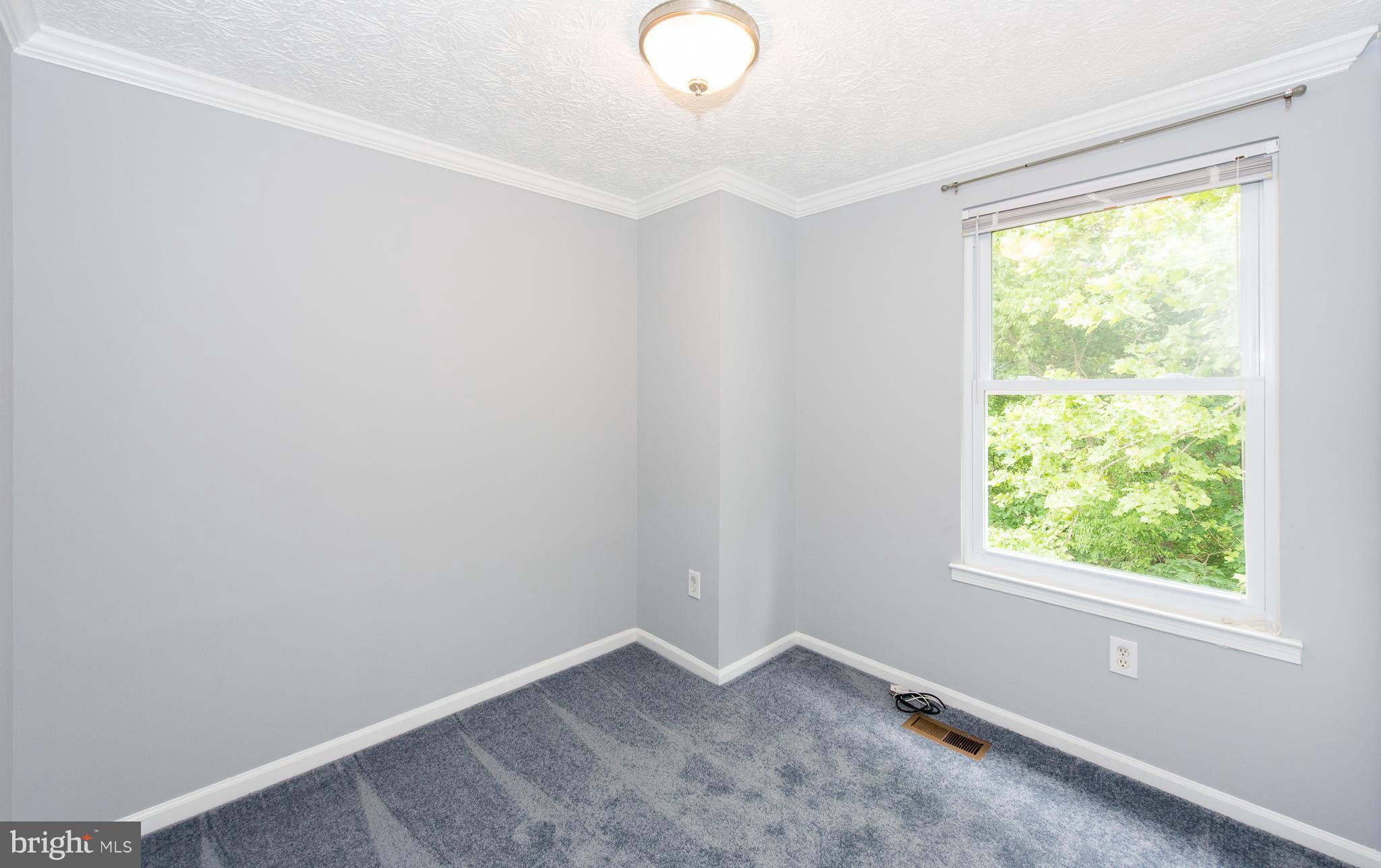 35 Hyacinth Road Baltimore, MD 21234 - Photo 13 of 23 an empty room with a window