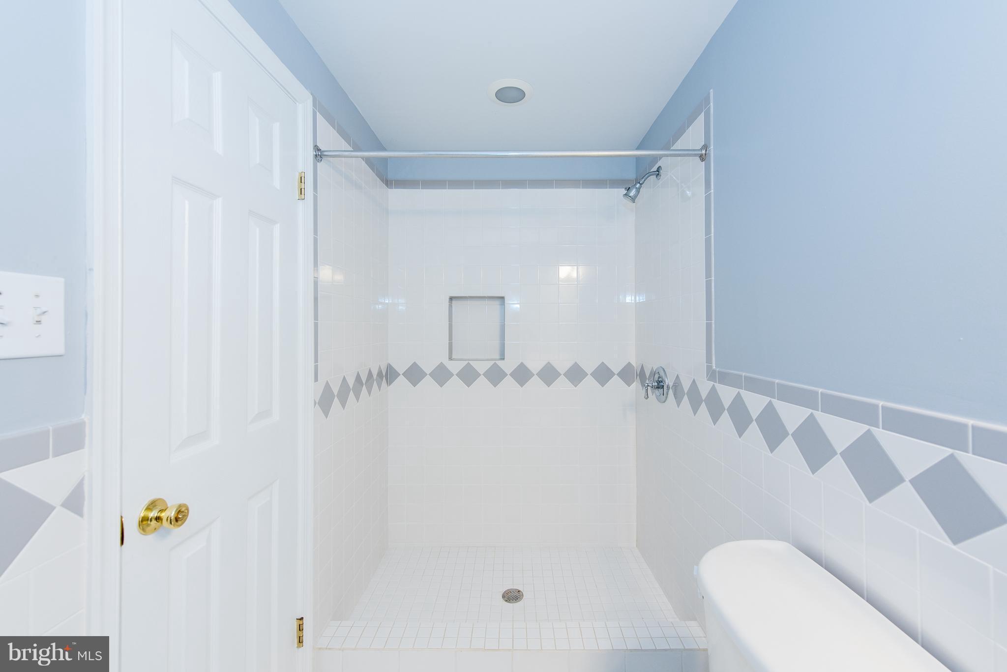 35 Hyacinth Road Baltimore, MD 21234 - Photo 15 of 23 a bathroom with a shower