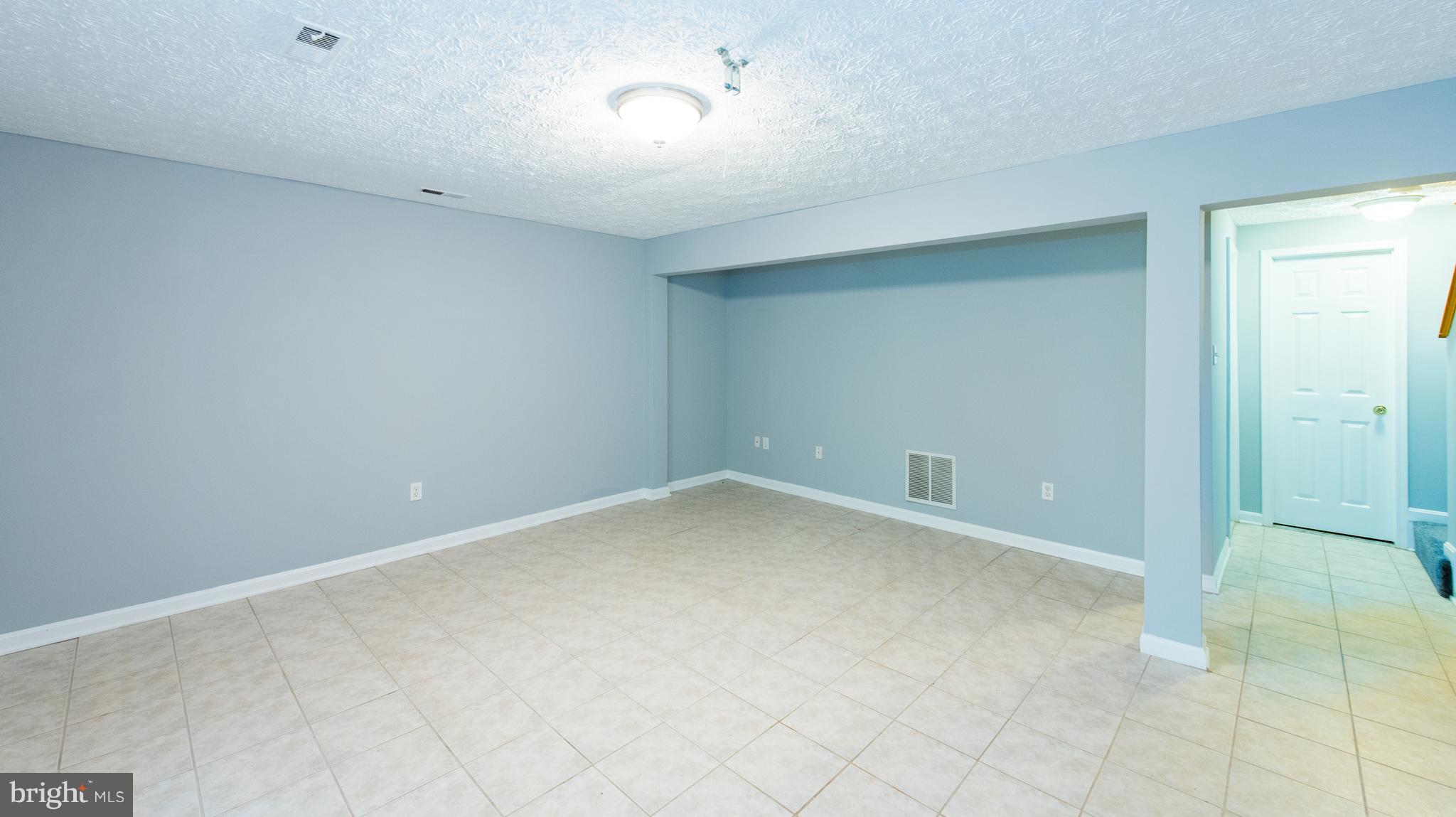 35 Hyacinth Road Baltimore, MD 21234 - Photo 18 of 23 an empty room with a empty space