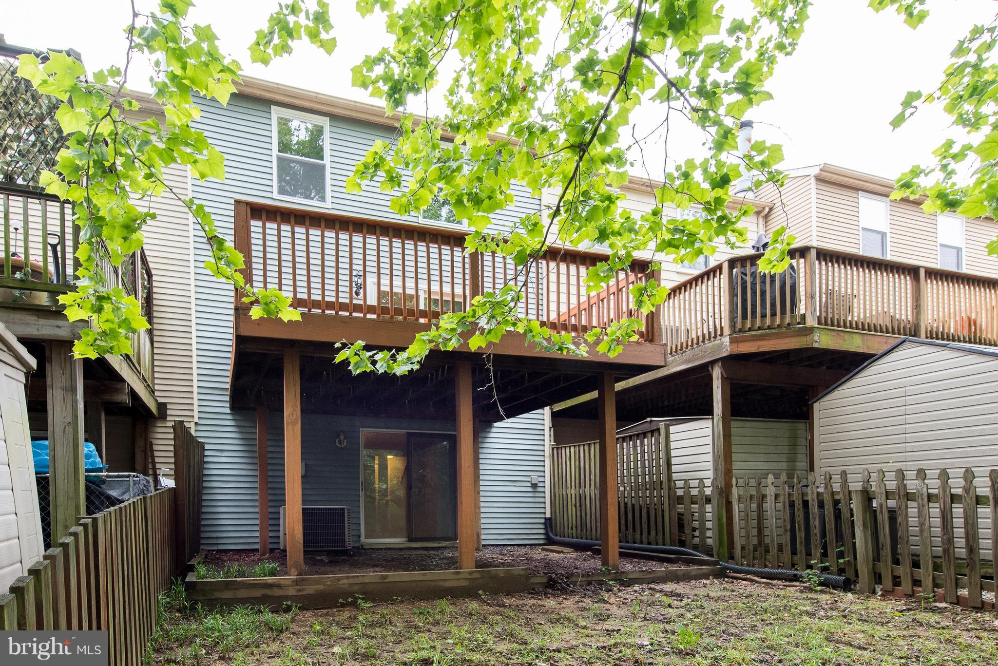 35 Hyacinth Road Baltimore, MD 21234 - Photo 23 of 23 a front view of a house with a garden