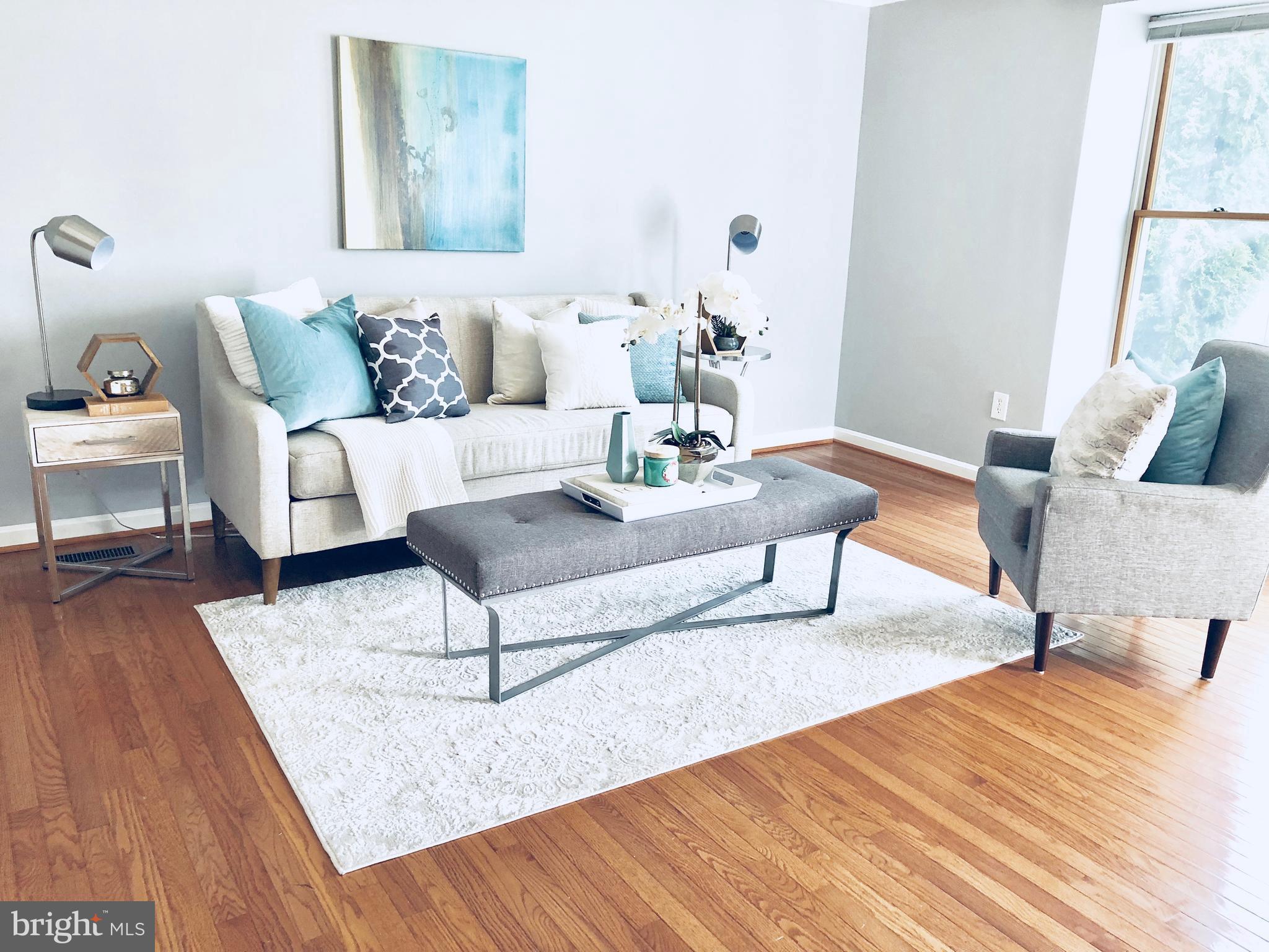 35 Hyacinth Road Baltimore, MD 21234 - Photo 4 of 23 a living room with furniture and a wooden floor