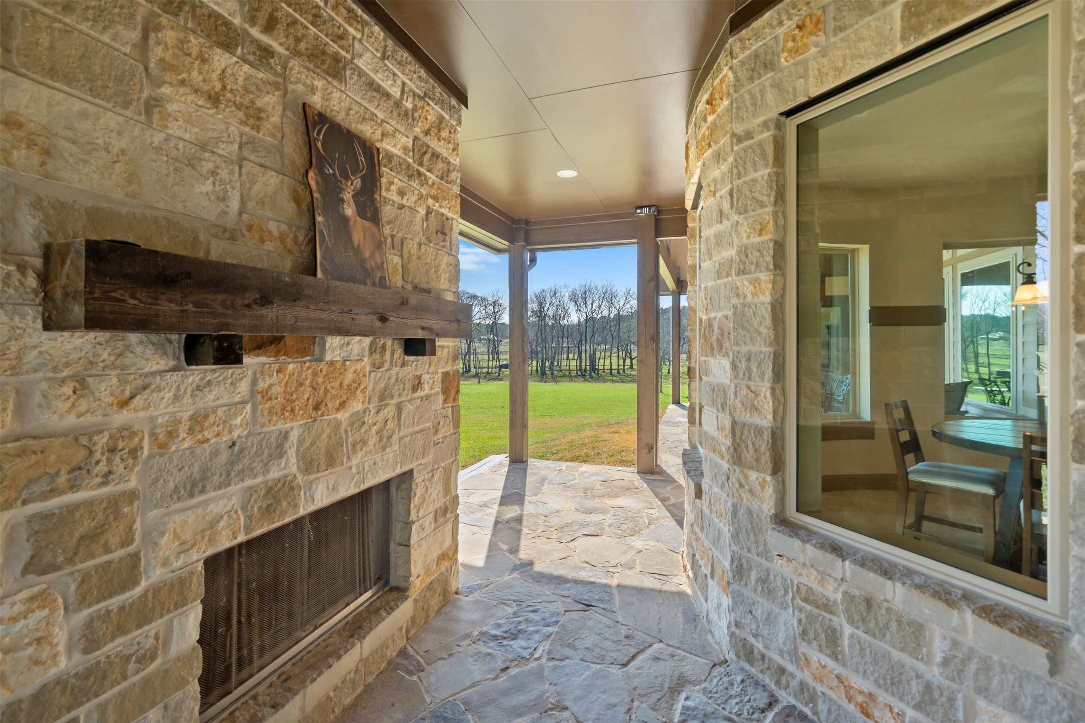 40 Stewart Road New Waverly, TX 77358 - Photo 44 of 50 Main House Fireplace on exterior patio
