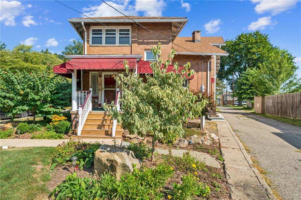 100 Grace Street Apollo, PA 15613 - Photo 2 of 42 a front view of a house with a porch