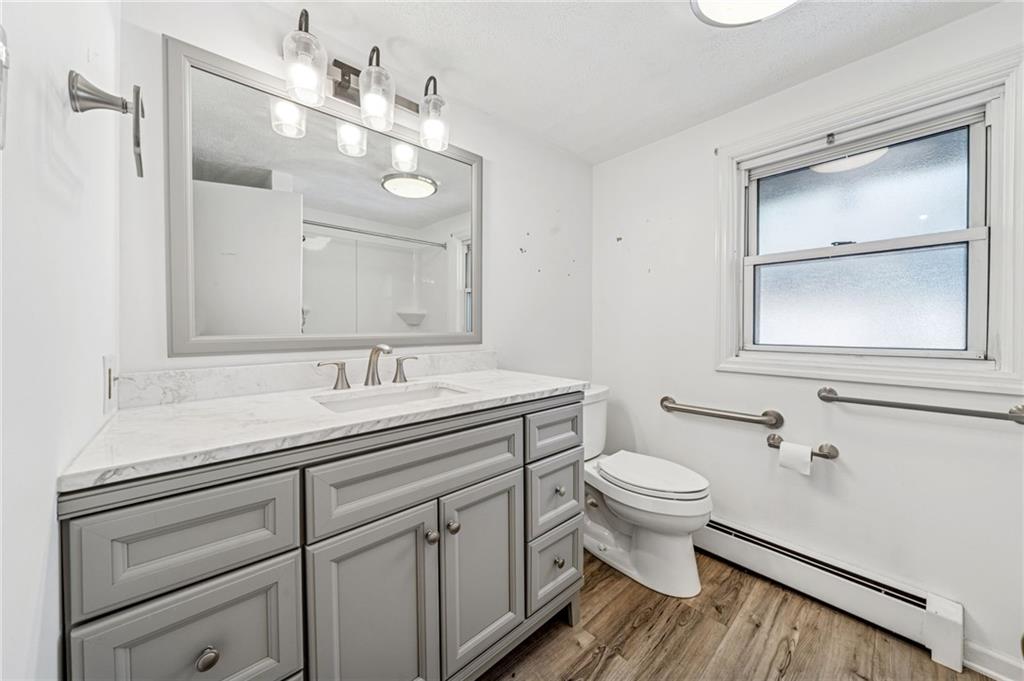 100 Grace Street Apollo, PA 15613 - Photo 23 of 42 a bathroom with a toilet sink and mirror