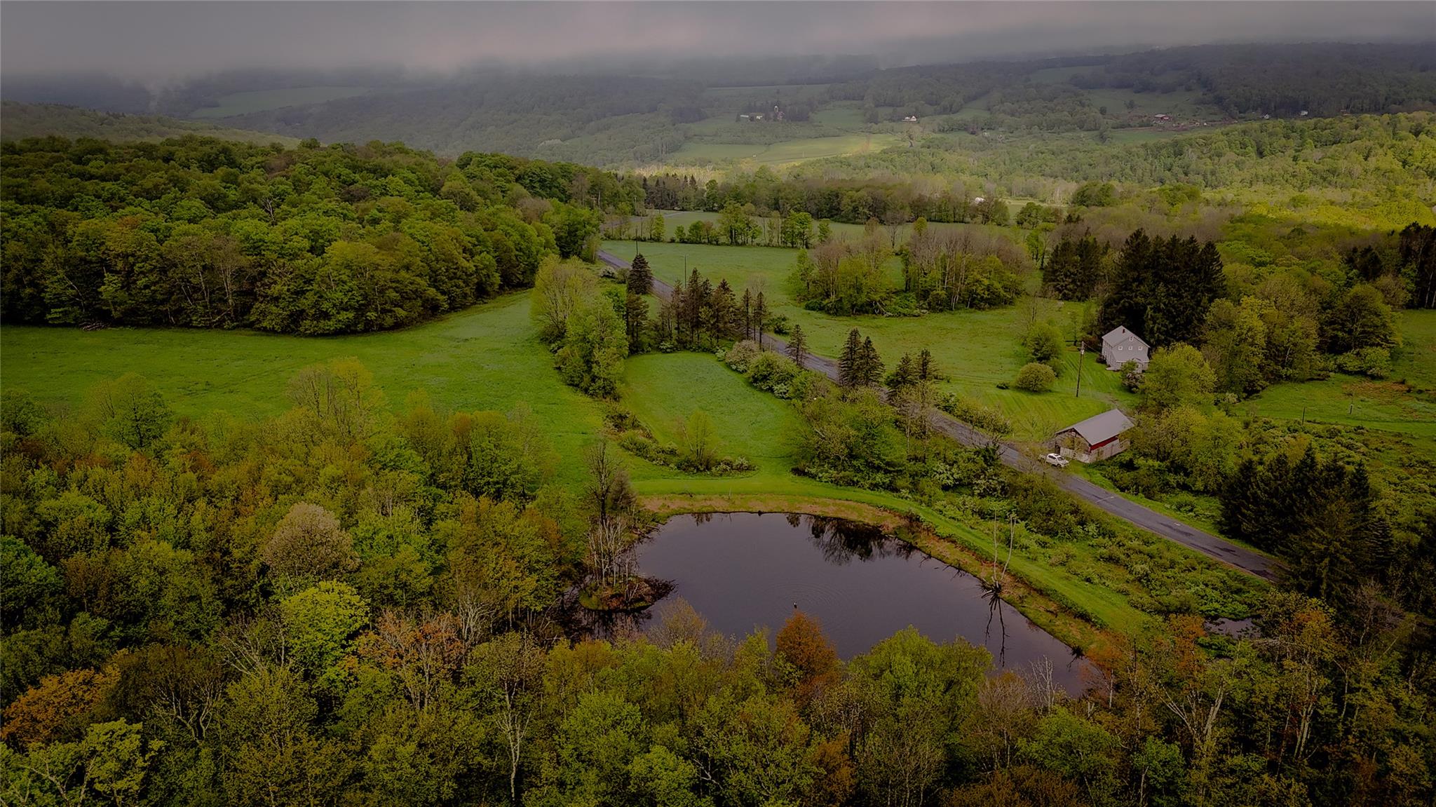 187 Hahn Road Jeffersonville, NY 12748 - Photo 4 of 9 a view of a lake with a yard