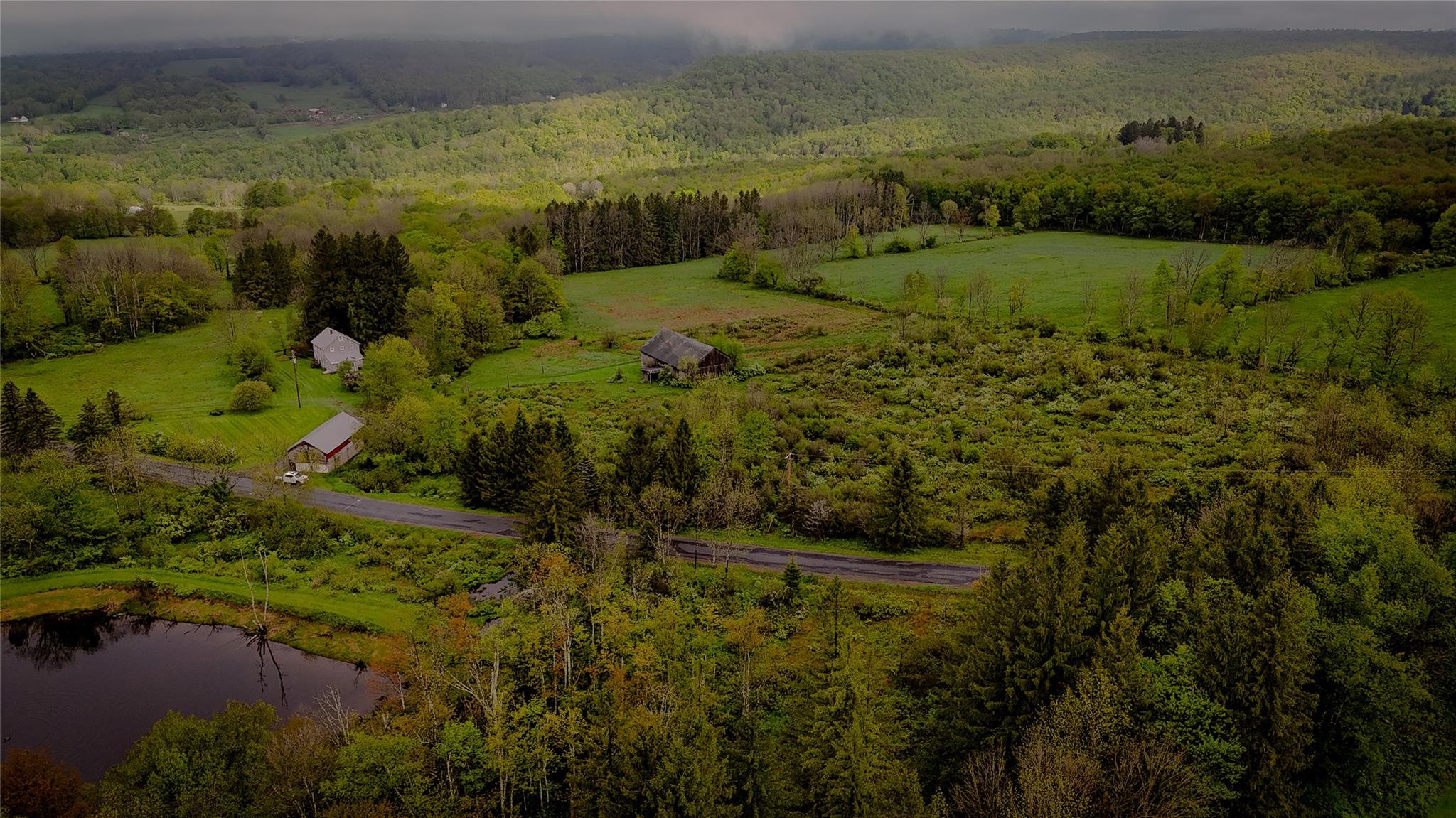 187 Hahn Road Jeffersonville, NY 12748 - Photo 7 of 9 a view of a lake with a yard