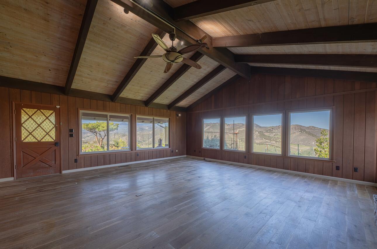 52259 Pine Canyon Road King City, CA 93930 - Photo 17 of 62 a view of empty room with wooden floor and fan