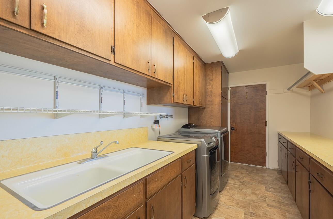 52259 Pine Canyon Road King City, CA 93930 - Photo 47 of 62 a kitchen with a sink cabinets and appliances