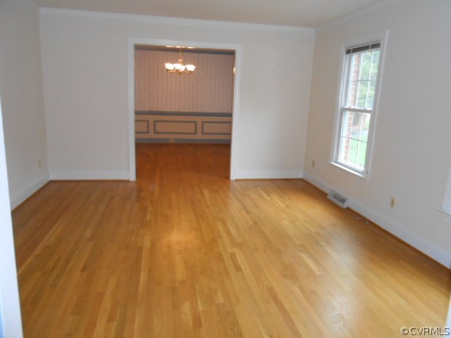 5604 Manitoba Road Chesterfield, VA 23832 - Photo 12 of 23 a view of empty room with wooden floor and fan