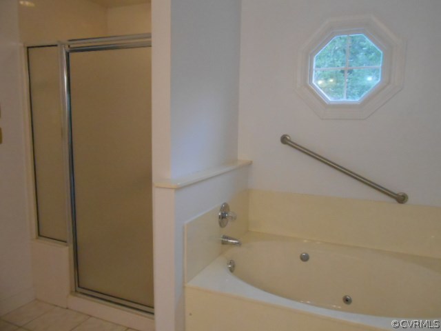 5604 Manitoba Road Chesterfield, VA 23832 - Photo 13 of 23 a bathroom with a bathtub and a shower