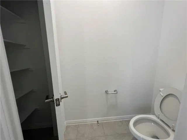 a kitchen with stainless steel appliances granite countertop a sink and a stove