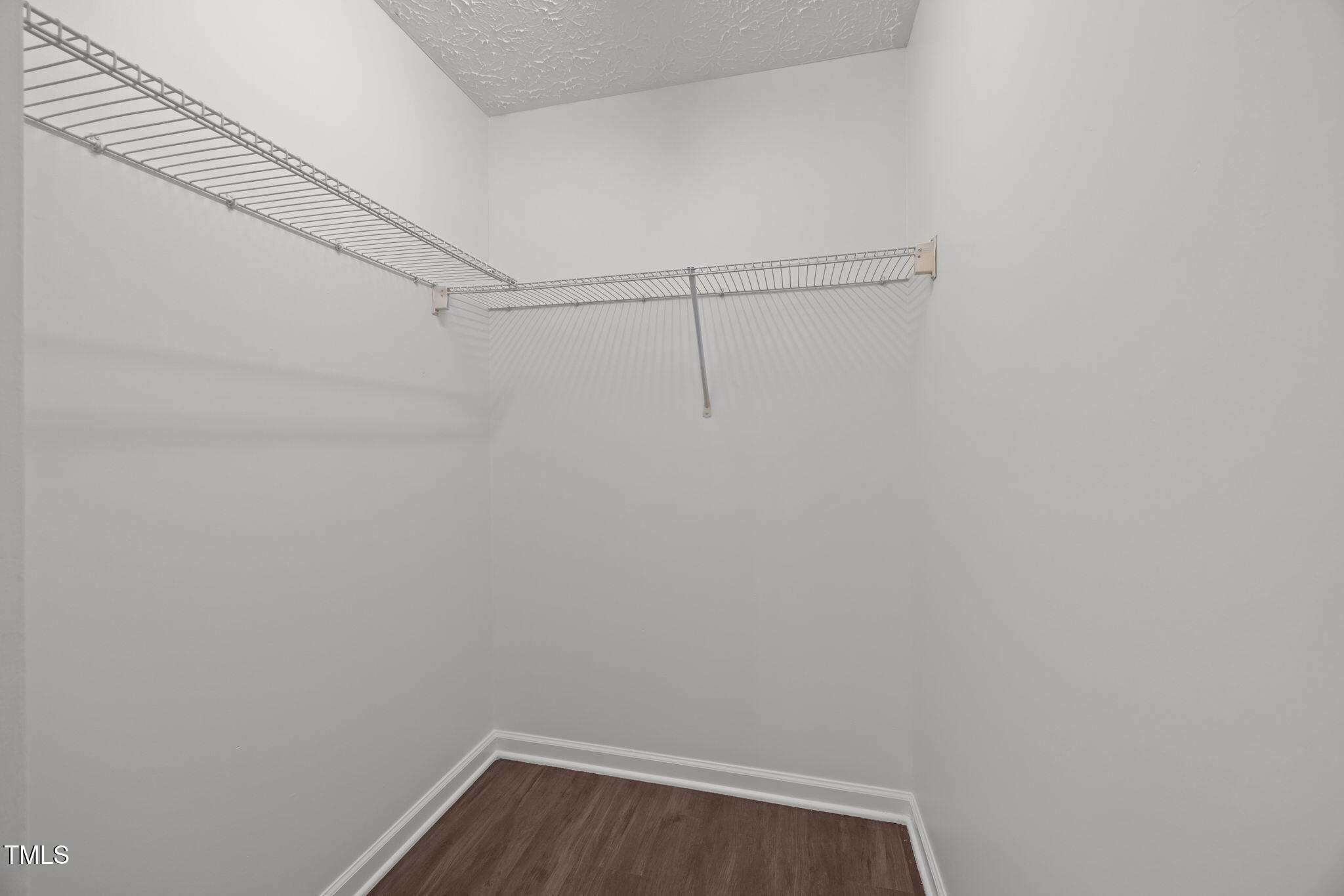 4232 Palafox Court Raleigh, NC 27604 - Photo 19 of 42 a view of a room with racks on the wall