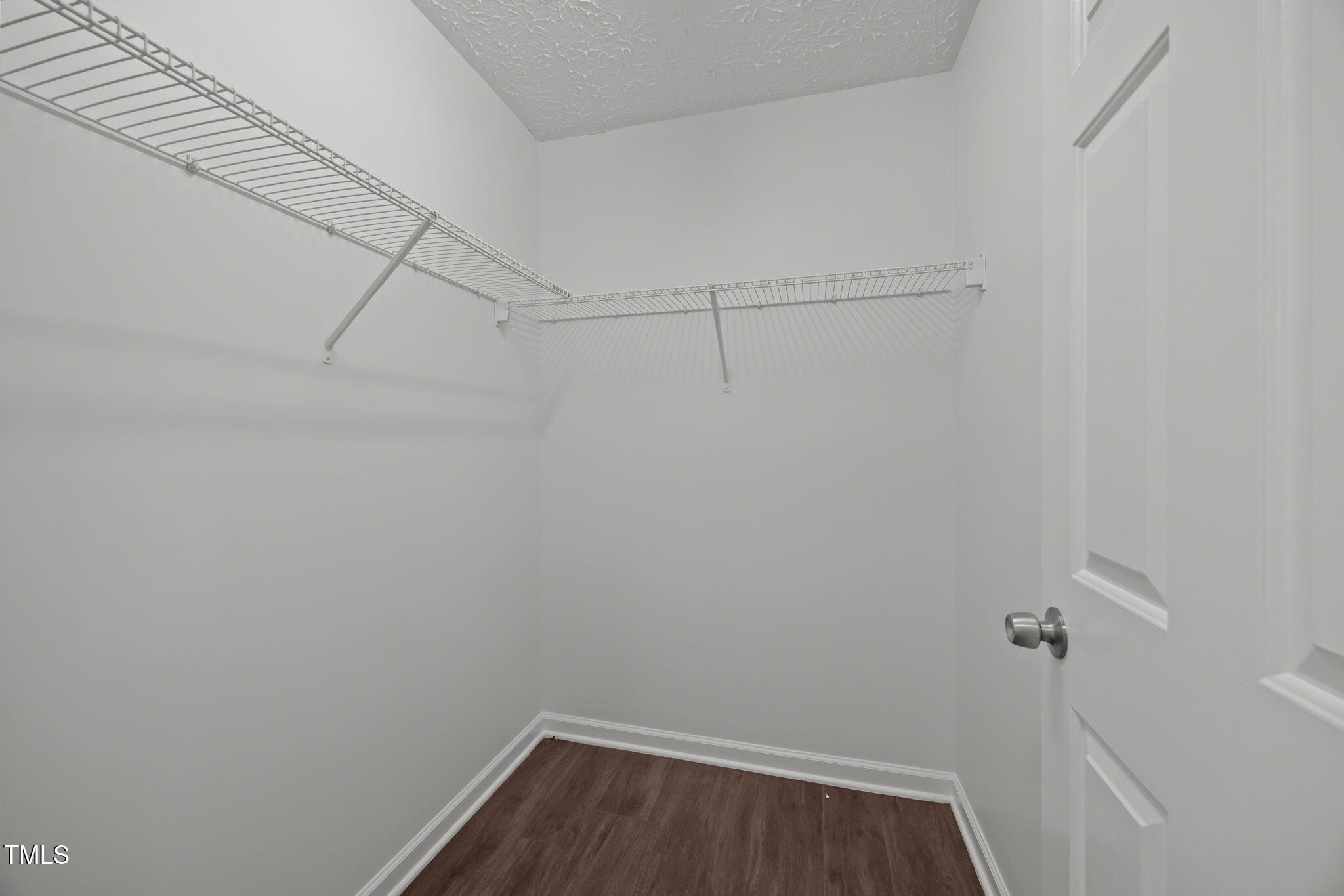 4232 Palafox Court Raleigh, NC 27604 - Photo 25 of 42 a view of a room with racks on the wall