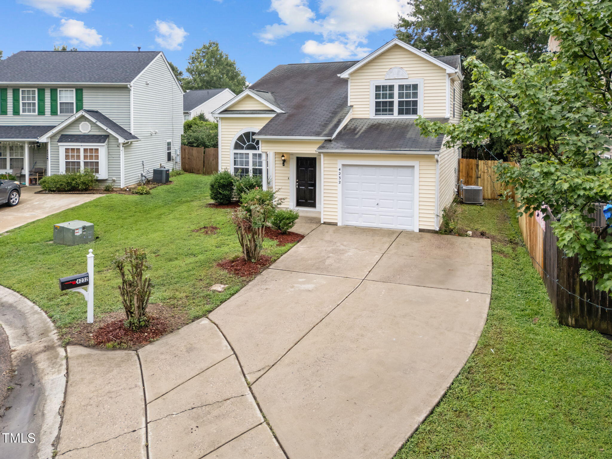 4232 Palafox Court Raleigh, NC 27604 - Photo 30 of 42 a front view of a house with a yard