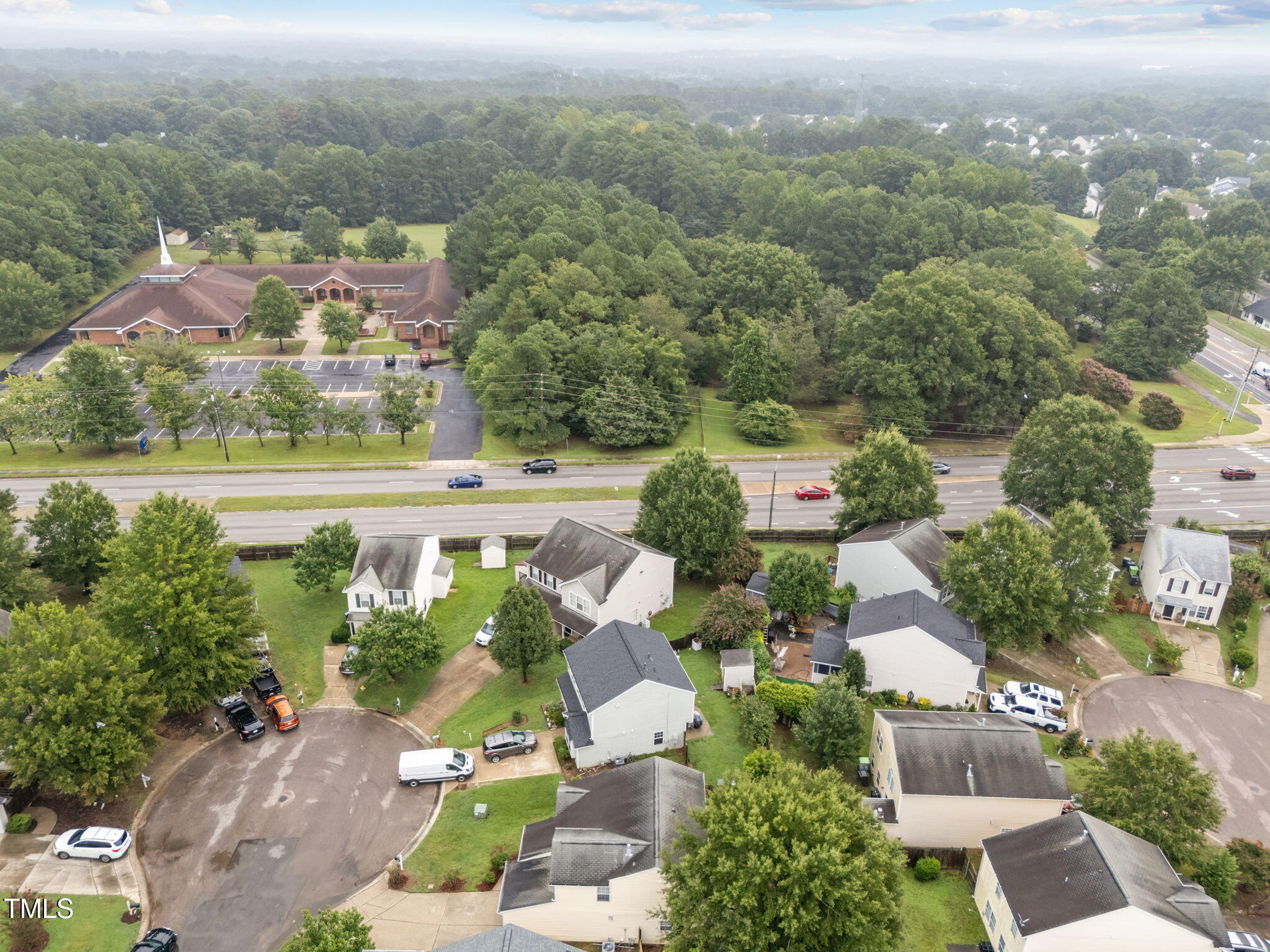 4232 Palafox Court Raleigh, NC 27604 - Photo 38 of 42 an aerial view of residential houses with outdoor space and trees