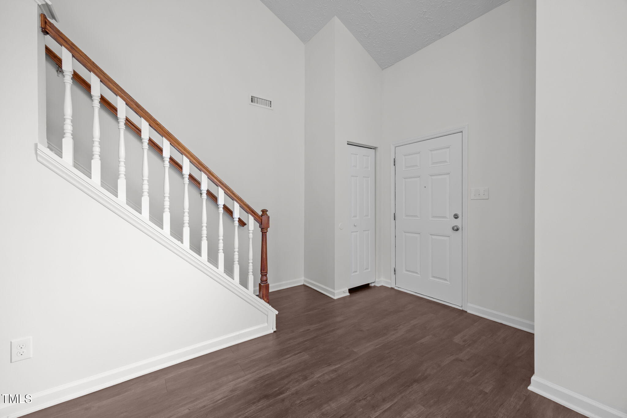 4232 Palafox Court Raleigh, NC 27604 - Photo 6 of 42 a view of an entryway with wooden floor